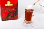 ⁦شاي غناوي بالهيل 200 جم - الچاي العراقي⁩ - الصورة ⁦2⁩